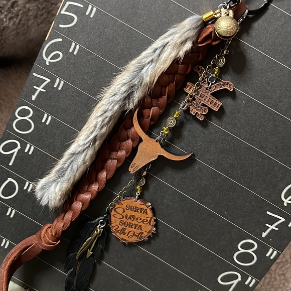 Fun and Unique Hand Crafted Leather and Feather Yellowstone Keychain with Charms - Picture 3 of 12